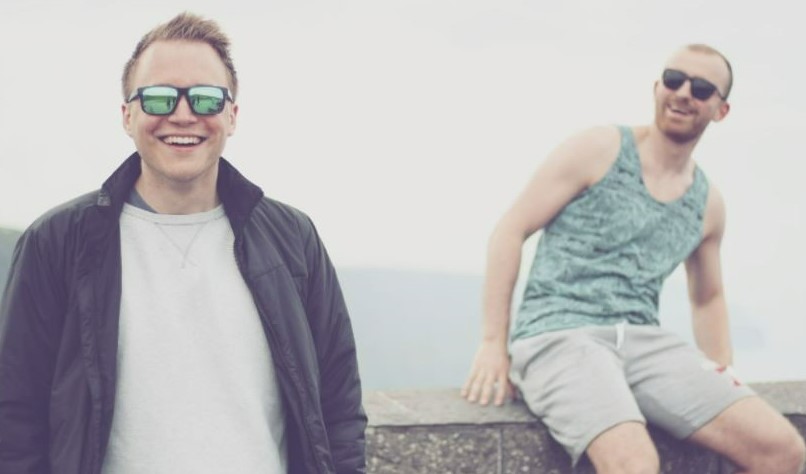 two happy guys in sunglasses 